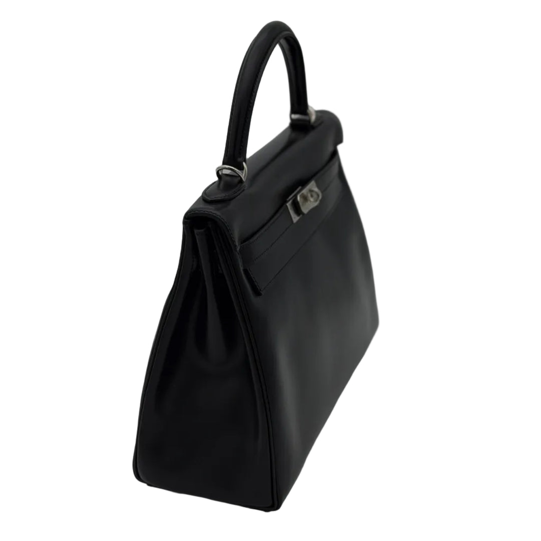 Hermes Kelly 32 Retourne Box Leder Schwarz Hardware Palladium