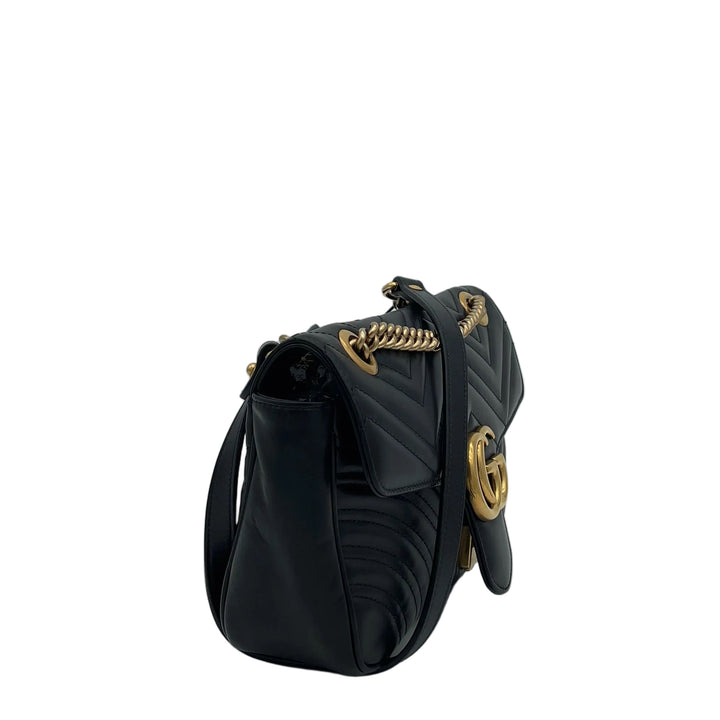 Gucci Tasche Marmont Medium Leder Schwarz mit GG Logoschließe Gold Kettenschultergurt