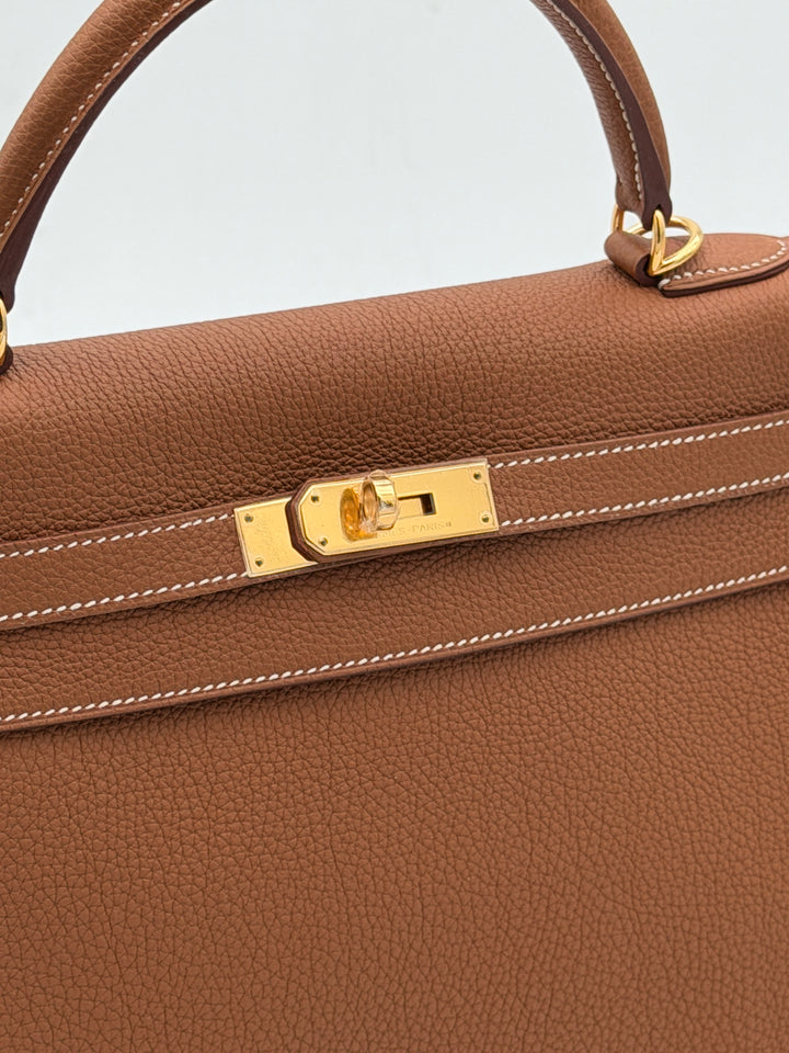 Hermes Kelly 32 Retourne
Togo Leder Gold HW Gold R=2014