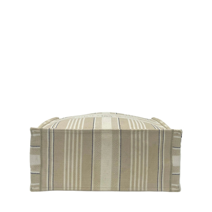 Christian Dior Book Tote Large Canvas Natural Cannage Raffia Creme
Stein Schwarz