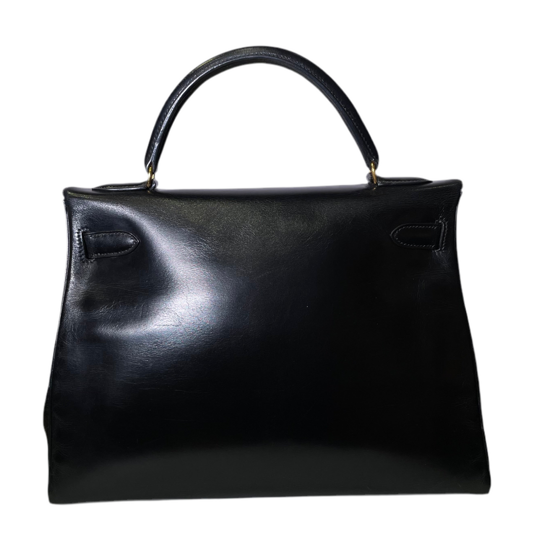Hermes Kelly 32 Retourne Box Leder Schwarz Hardware Gold