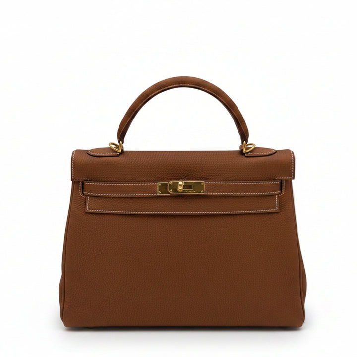 Hermes Kelly 32 Retourne
Togo Leder Gold HW Gold R=2014