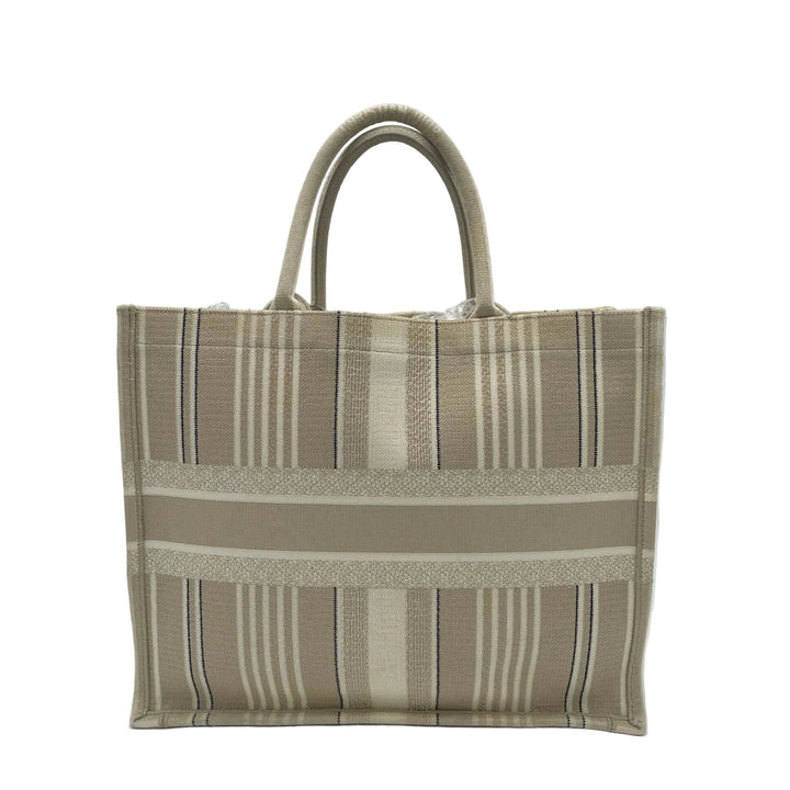 Christian Dior Book Tote Large Canvas Natural Cannage Raffia Creme
Stein Schwarz