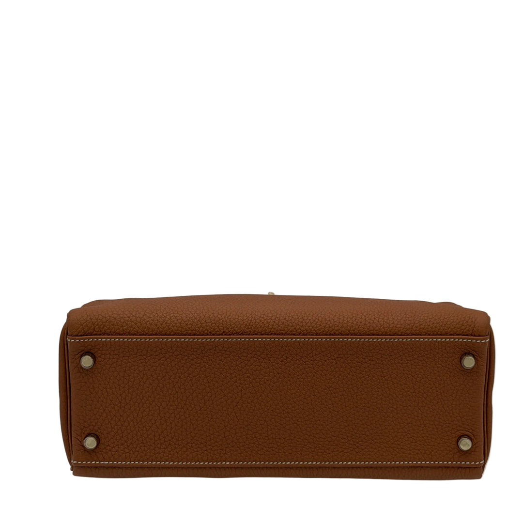 Hermes Kelly 32 Retourne
Togo Leder Gold HW Gold R=2014