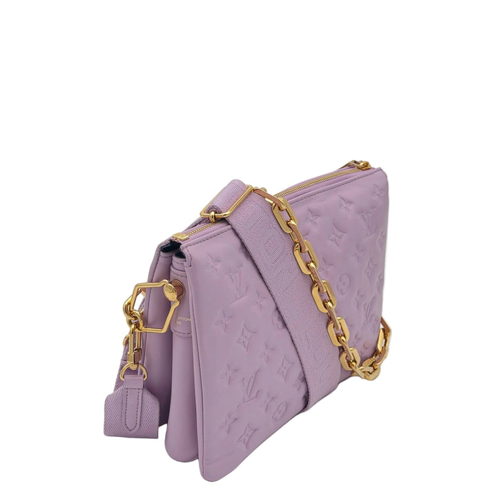 Louis Vuitton Tasche Coussin PMLeder Flieder Hardware GoldMit Kettenriemen und Canvas Riemen